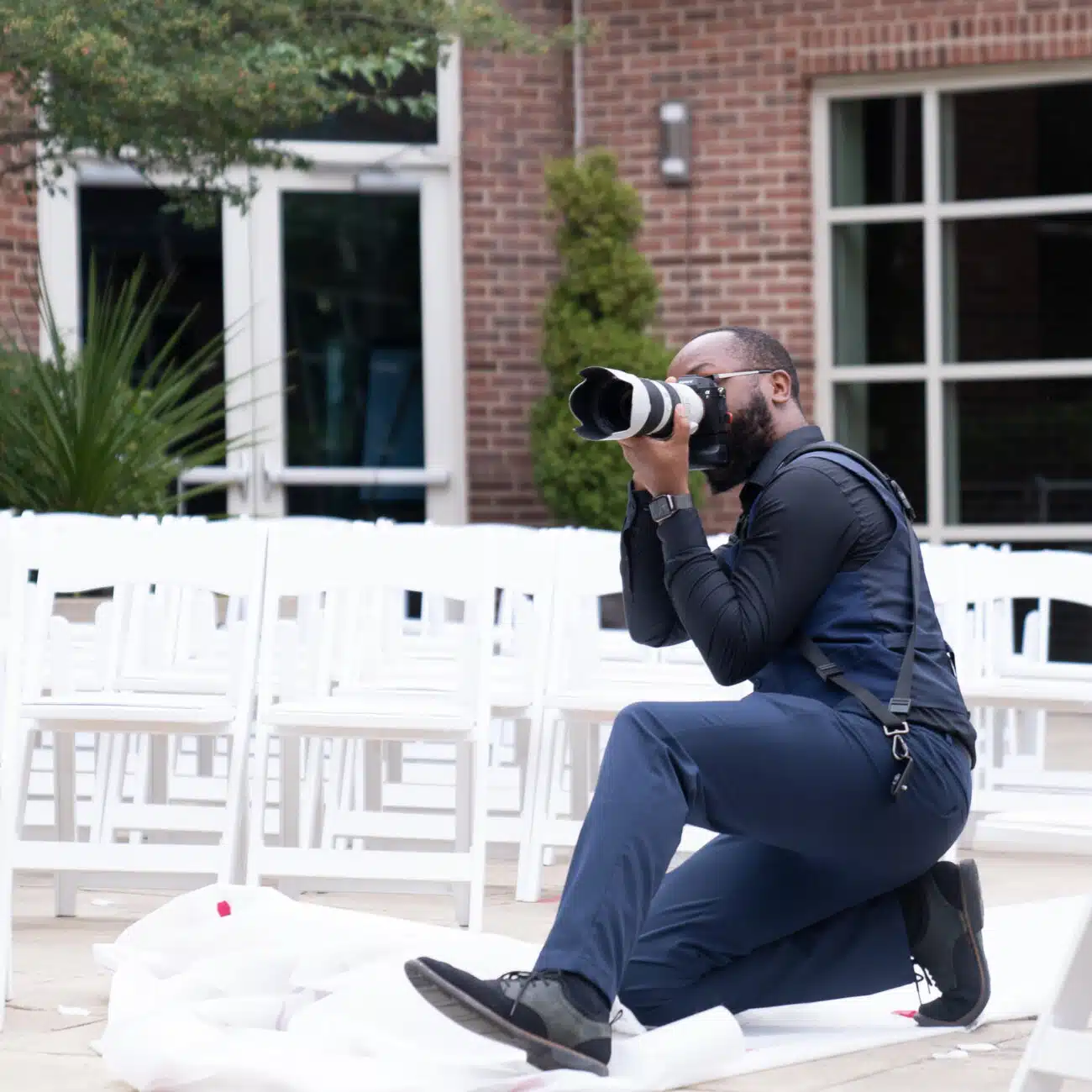 Dontavious Chesson, getting into position to capture the wedding party images in the Charolotte NC wedding Venue location.