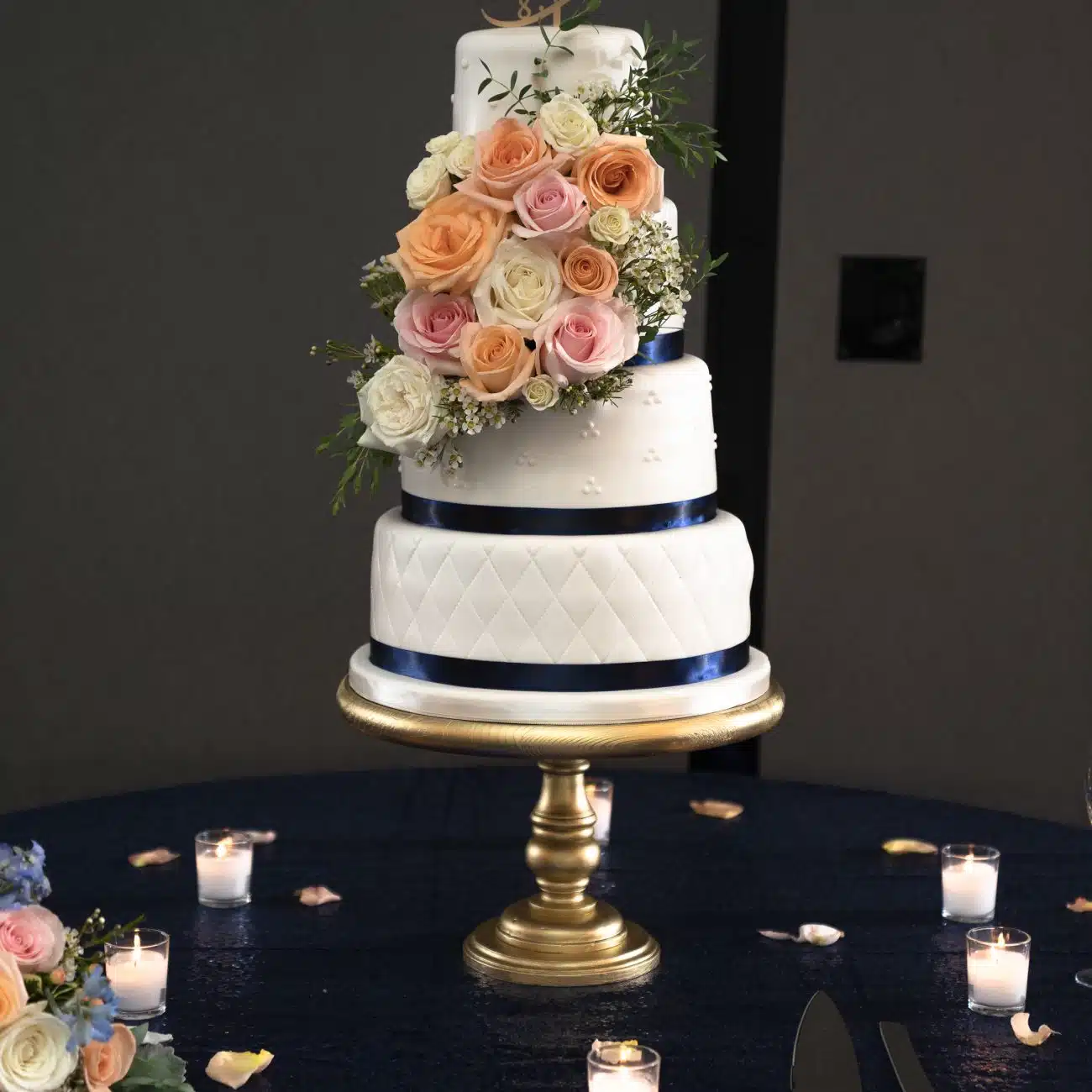 The wedding cake being placed in the convention center located in Greenville, NC